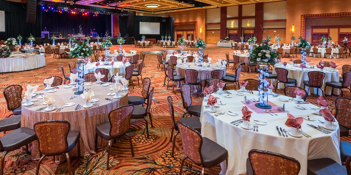 Event center room set up for a dining experience.